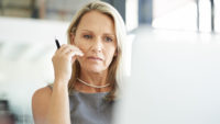 woman working at her computer