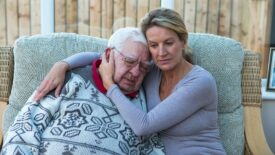 woman embracing her family member