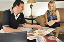 carpet salesmen with woman customer