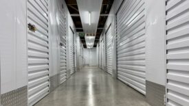 Interior of a modern self storage facility with metal doors and locks